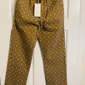 Gucci HORSEBIT JACQUARD-LOGO TRACK PANTS IN BROWN, LENGTH IS 40 inches.